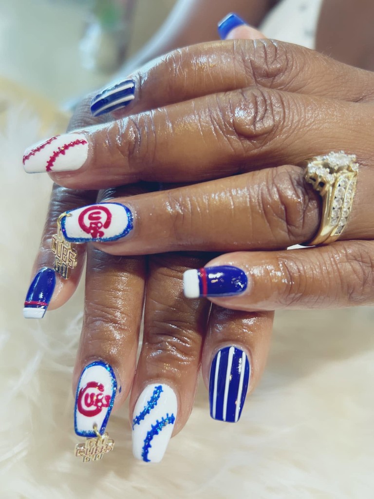 Bold colorful manicure with detailed nail art