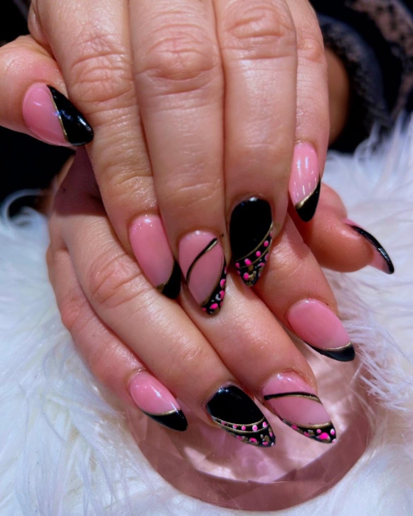 Custom nail enhancements with artistic finishes