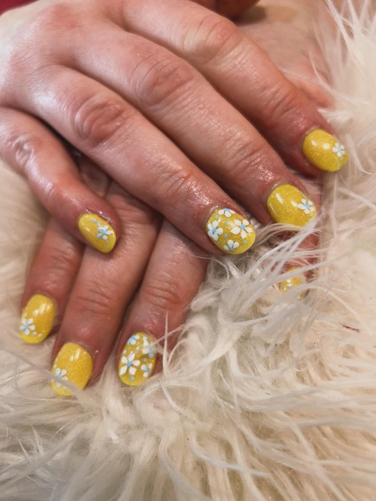 Winter holiday nails with candy cane and snowflake art