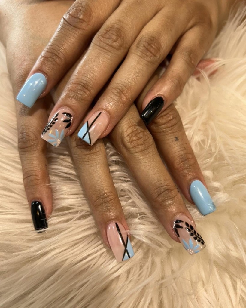 Halloween orange and black bat nail art