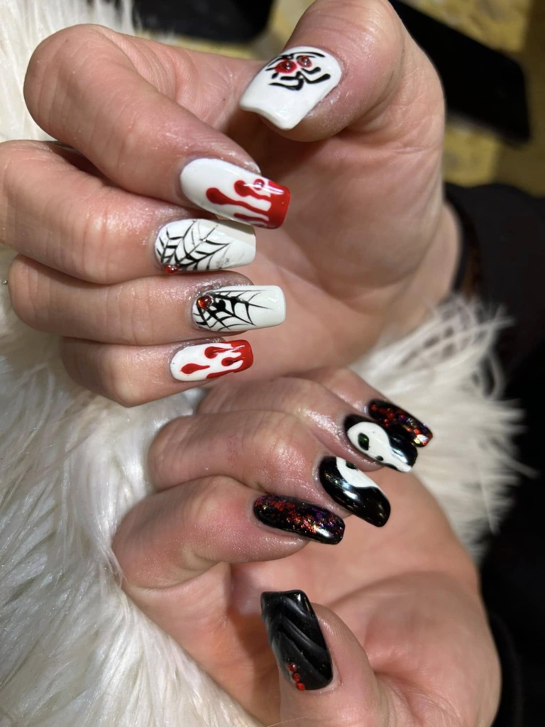 Classic French manicure with subtle white accents