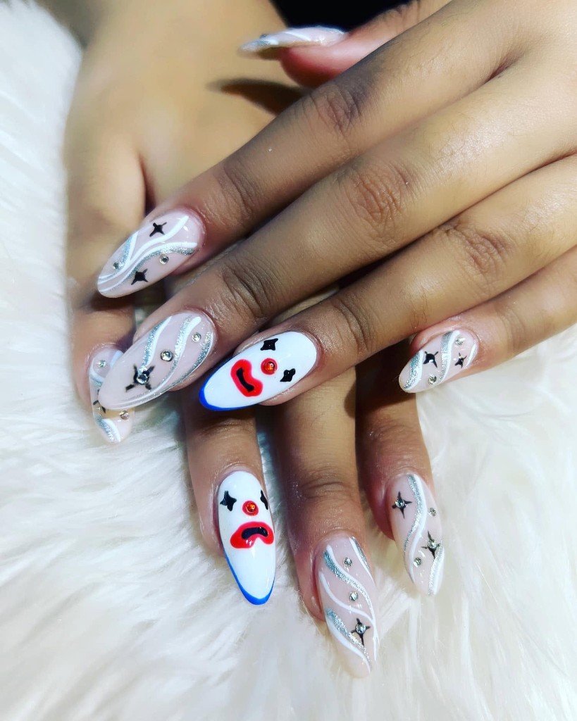 Glossy manicure with hand-painted accents