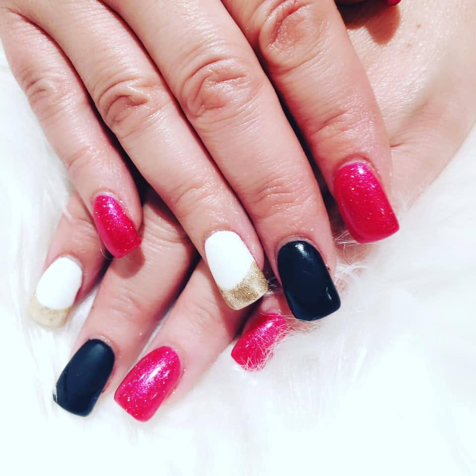 Hand-painted nail art with glossy finish