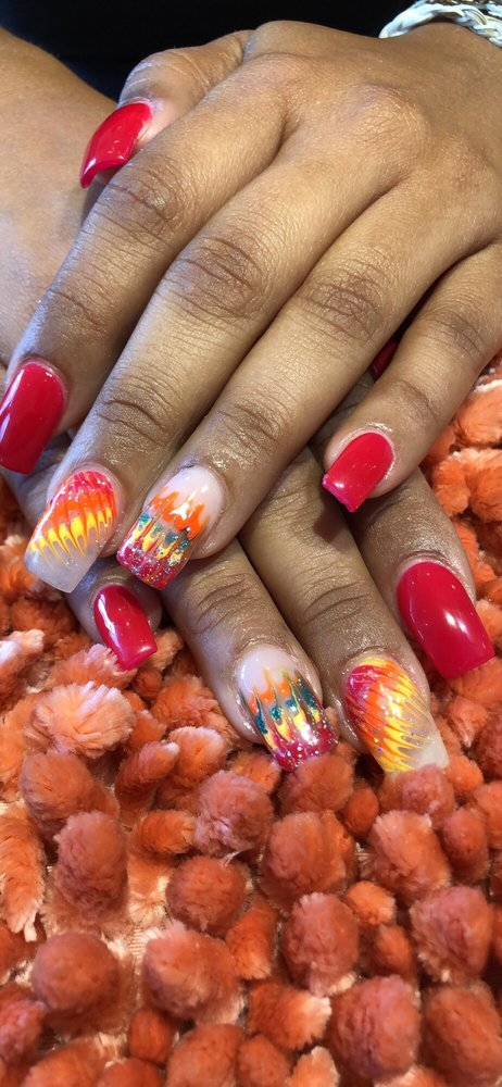 Pink glitter coffin nails with floral painting