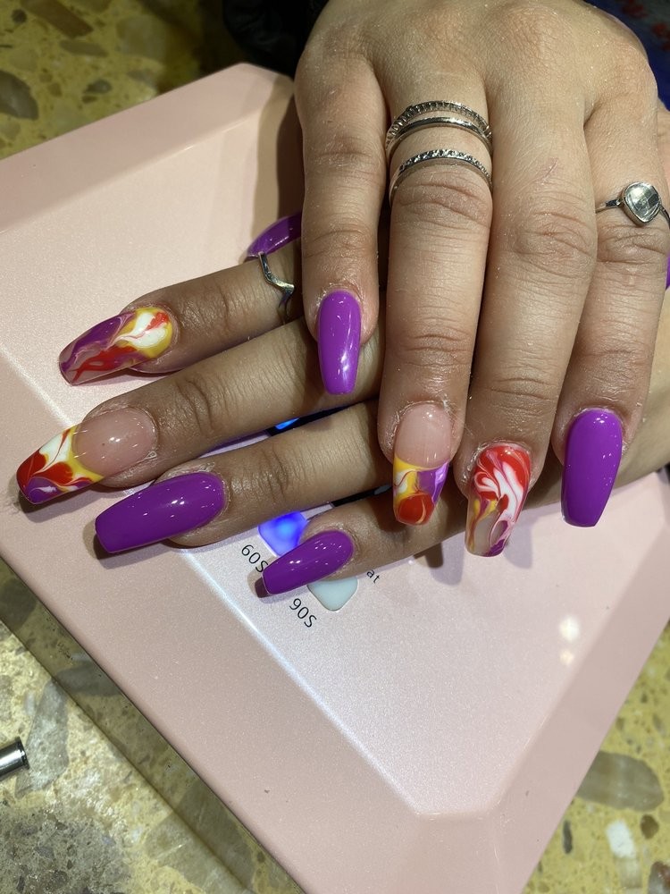 Red glitter Christmas nails with candy cane art