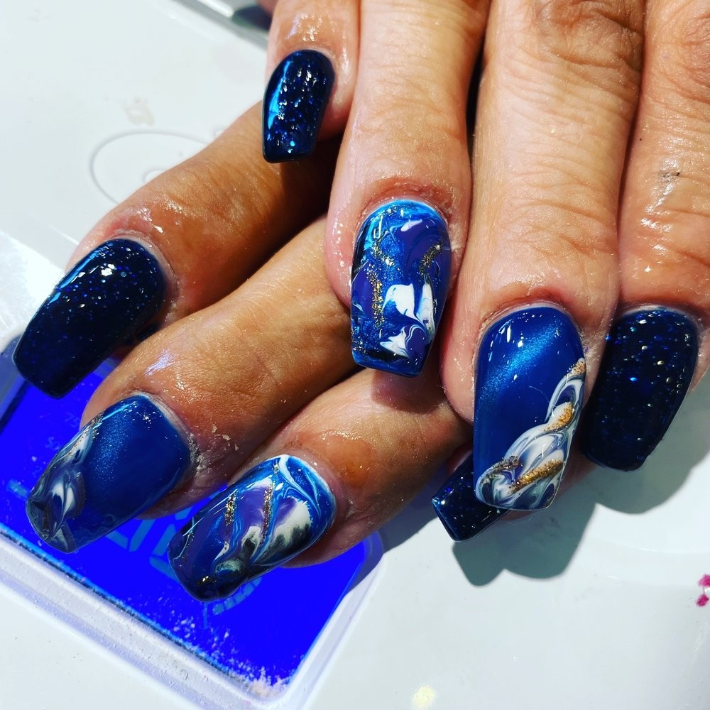 Bold artistic nails with polished professional finish