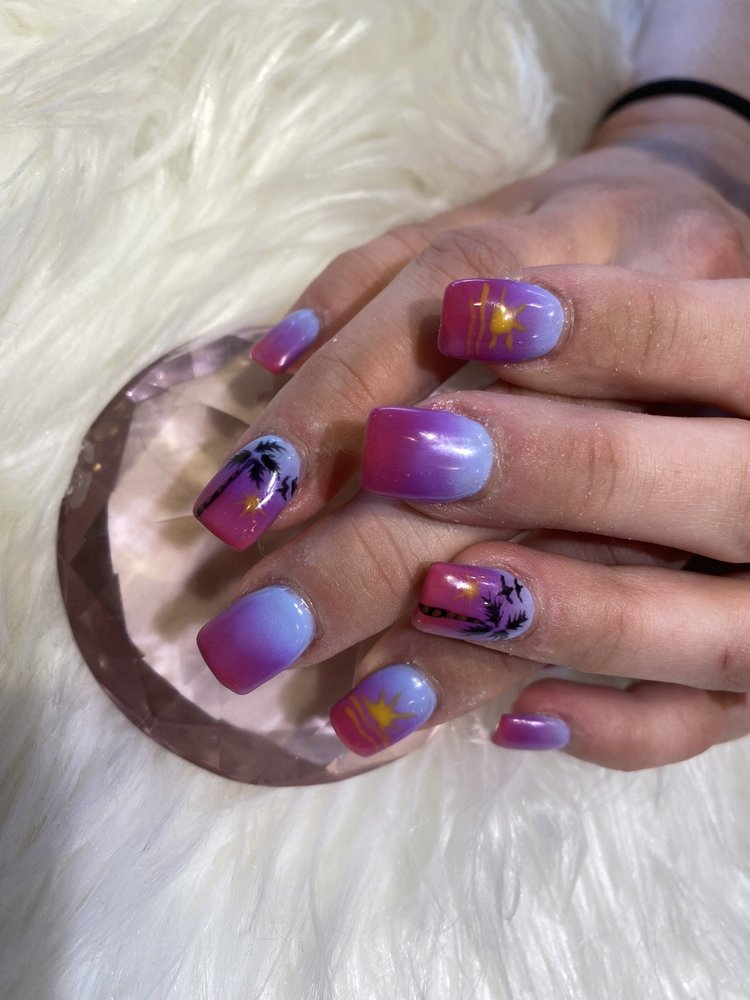 Colorful custom nail designs with glossy finish
