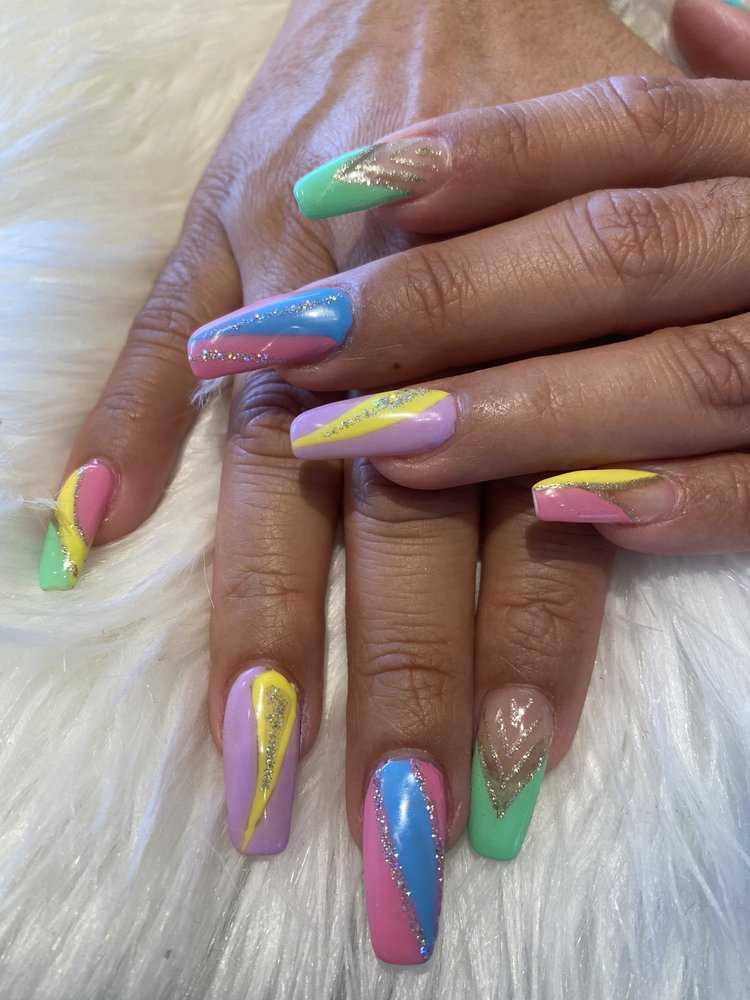 Hand-painted seasonal nails with polished shine